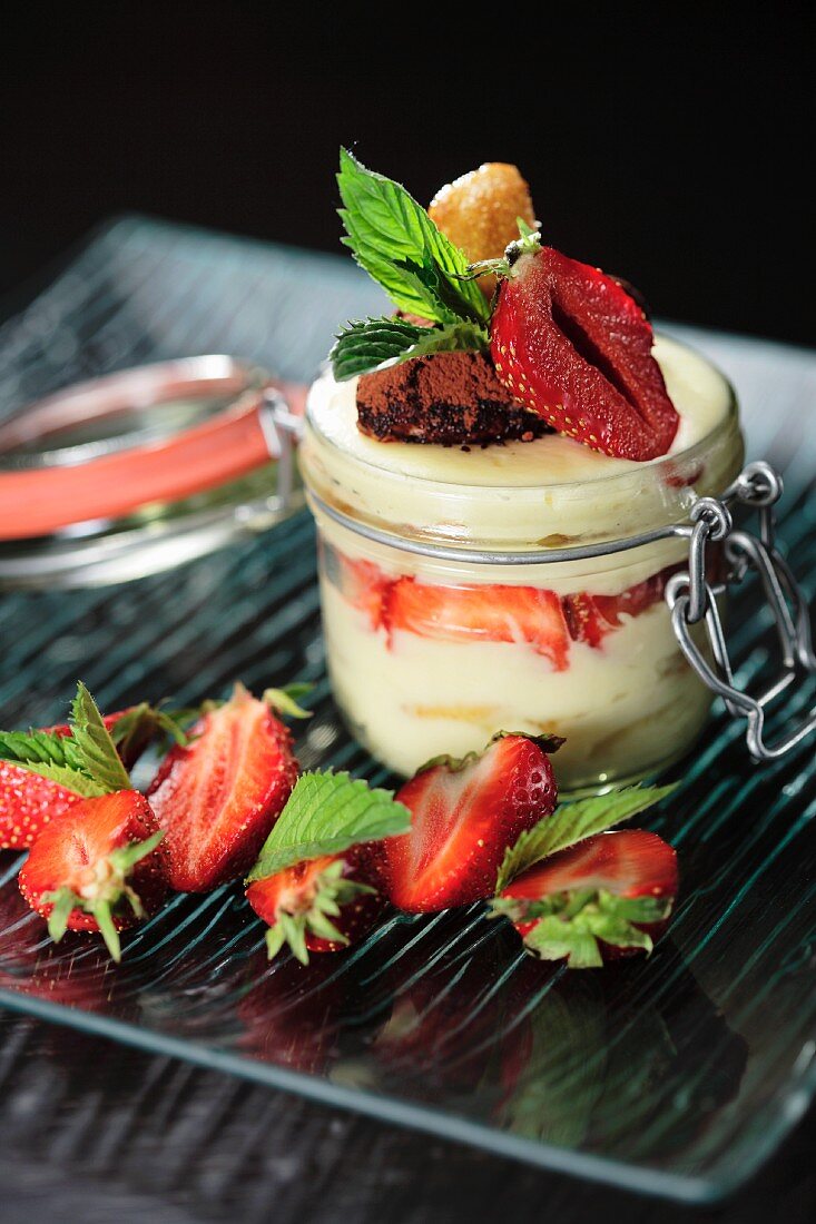 Homemade yoghurt with strawberries in a jar