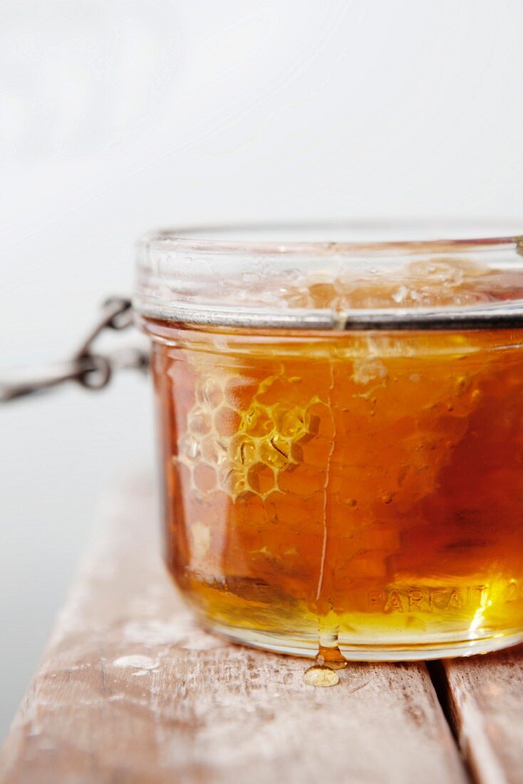 Honey and Honeycomb in a Glass Jar