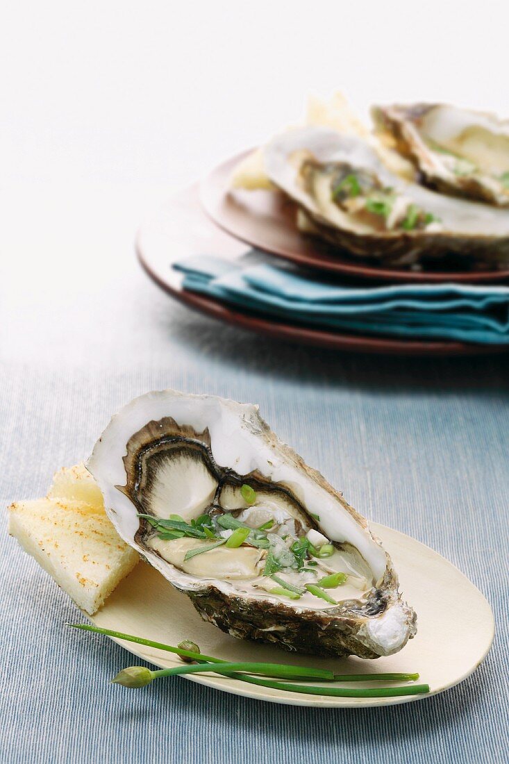Ostriche al burro aromatico (oysters with herb butter)