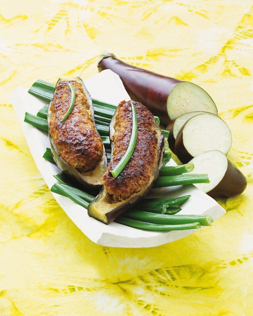 Aubergines stuffed with pork