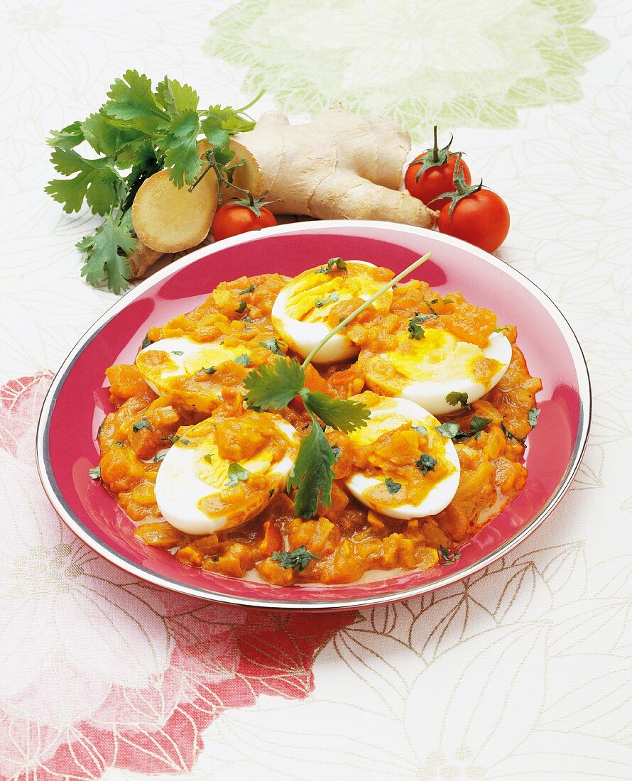 Eggs with a spicy tomato and ginger sauce