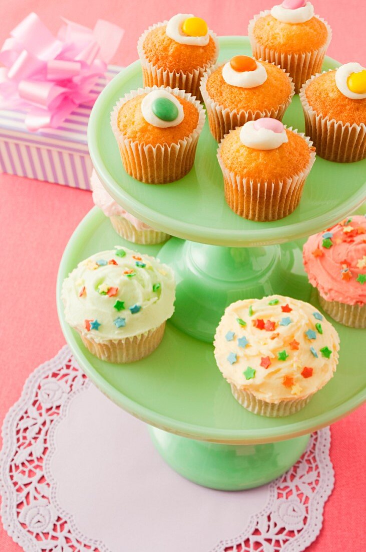 A selection of cupcakes on a cake stand