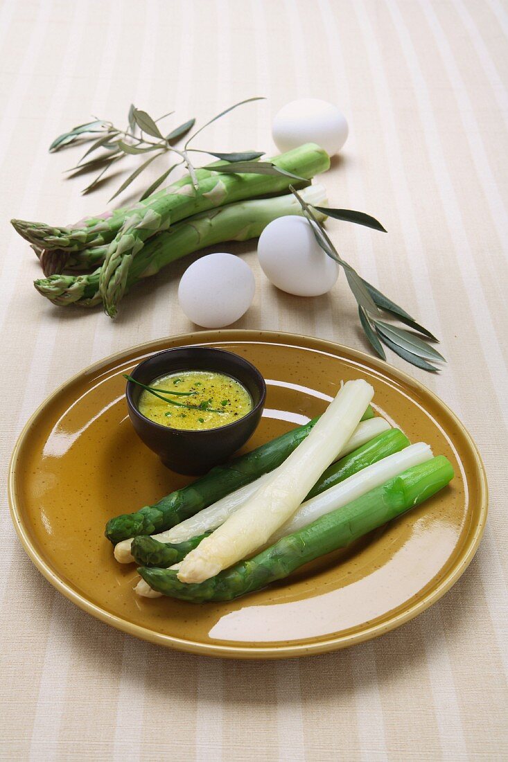 Green and white asparagus with a mustard sauce