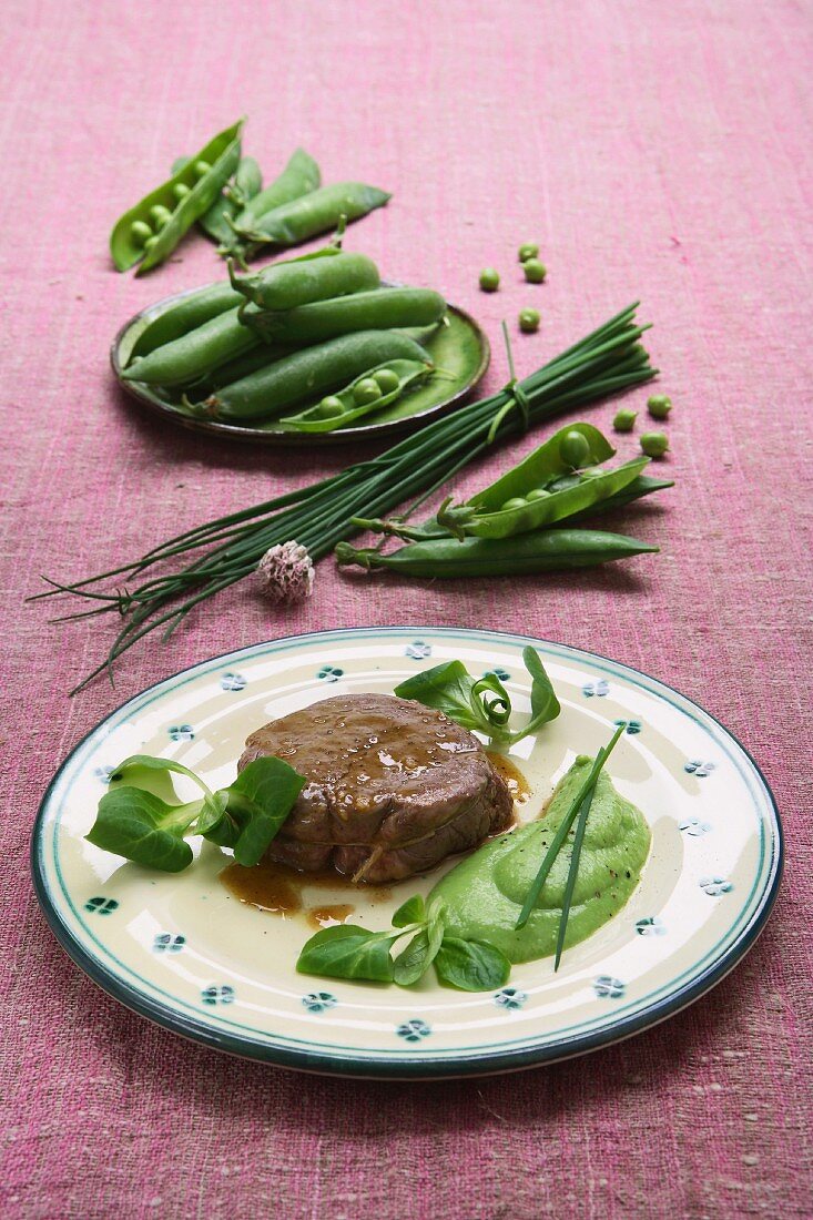 Beef fillet with mushy peas