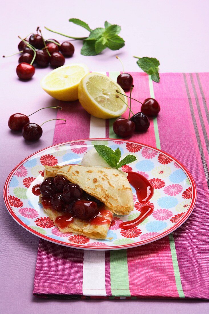 Crepes with cherry compote