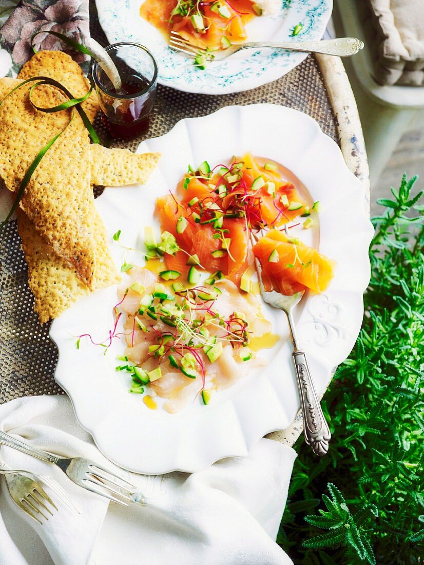 Fish carpaccio with edible shoots and crispbread