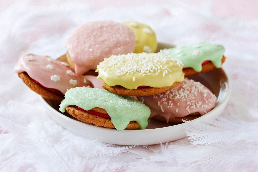 Easter biscuits topped with icing and sugar sprinkles