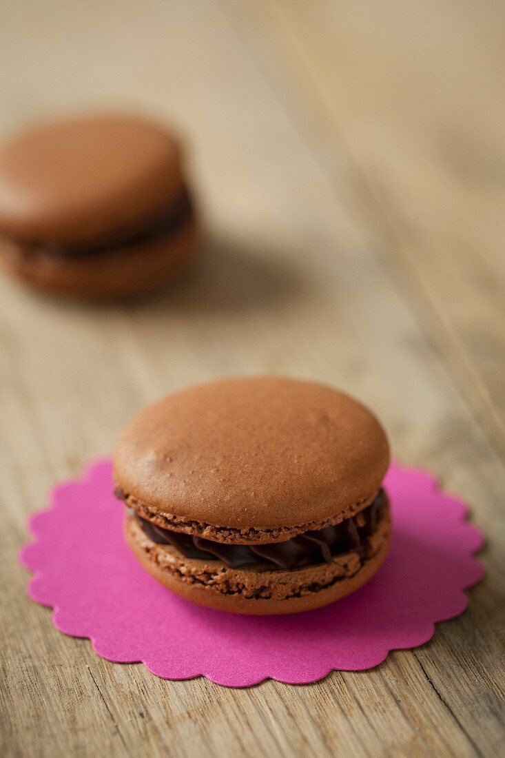 A Chocolate Macaroon on a Small Pink Doily