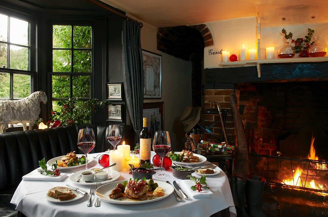 A table laid for Christmas dinner in rustic restaurant
