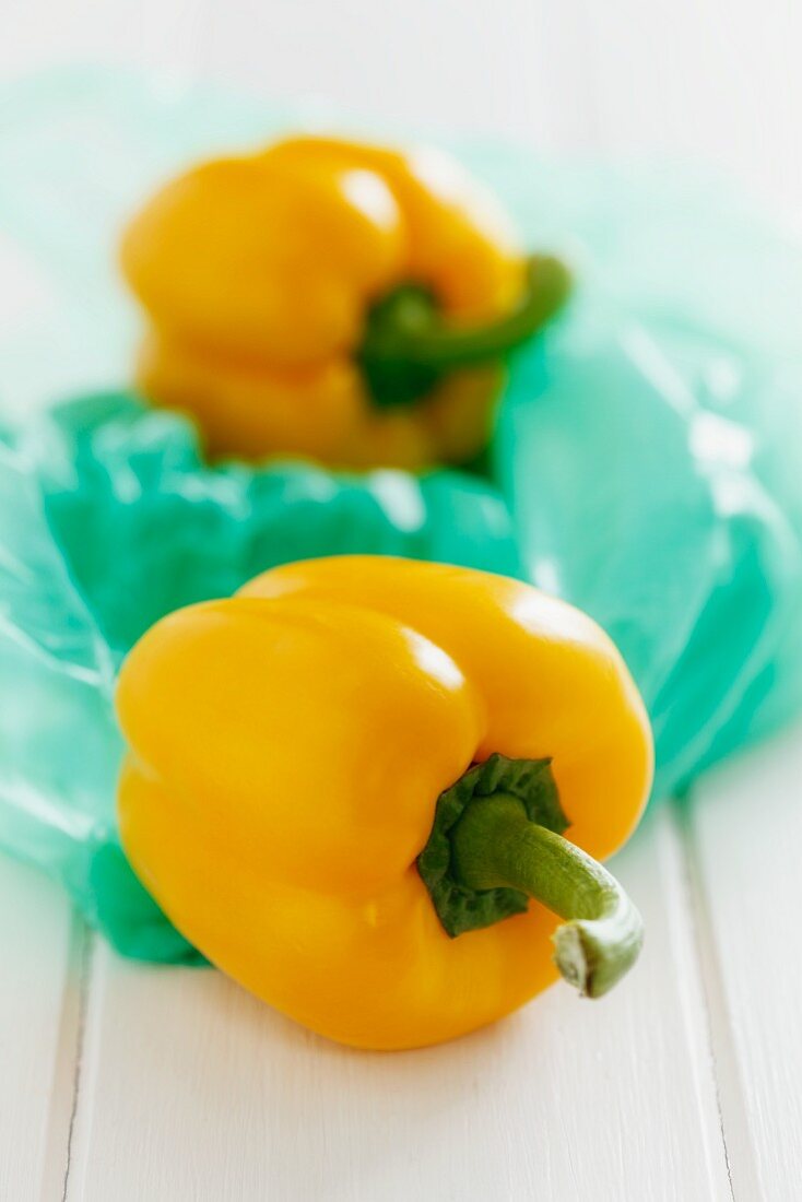 Yellow peppers on a plastic bag