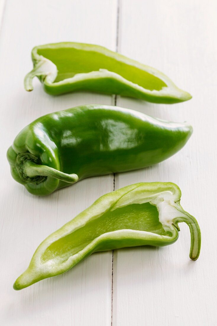 Green pointed peppers, whole and halved