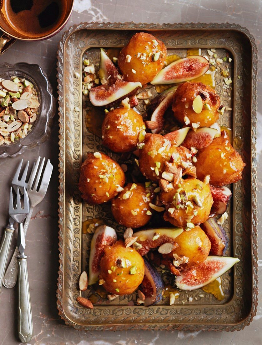Deep-fried doughnuts with orange caramel and figs