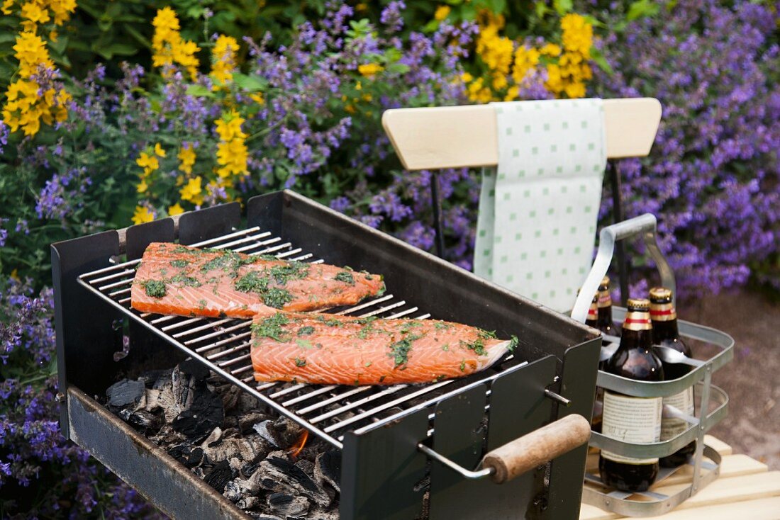 Marinated salmon fillets on a grill (Sweden)