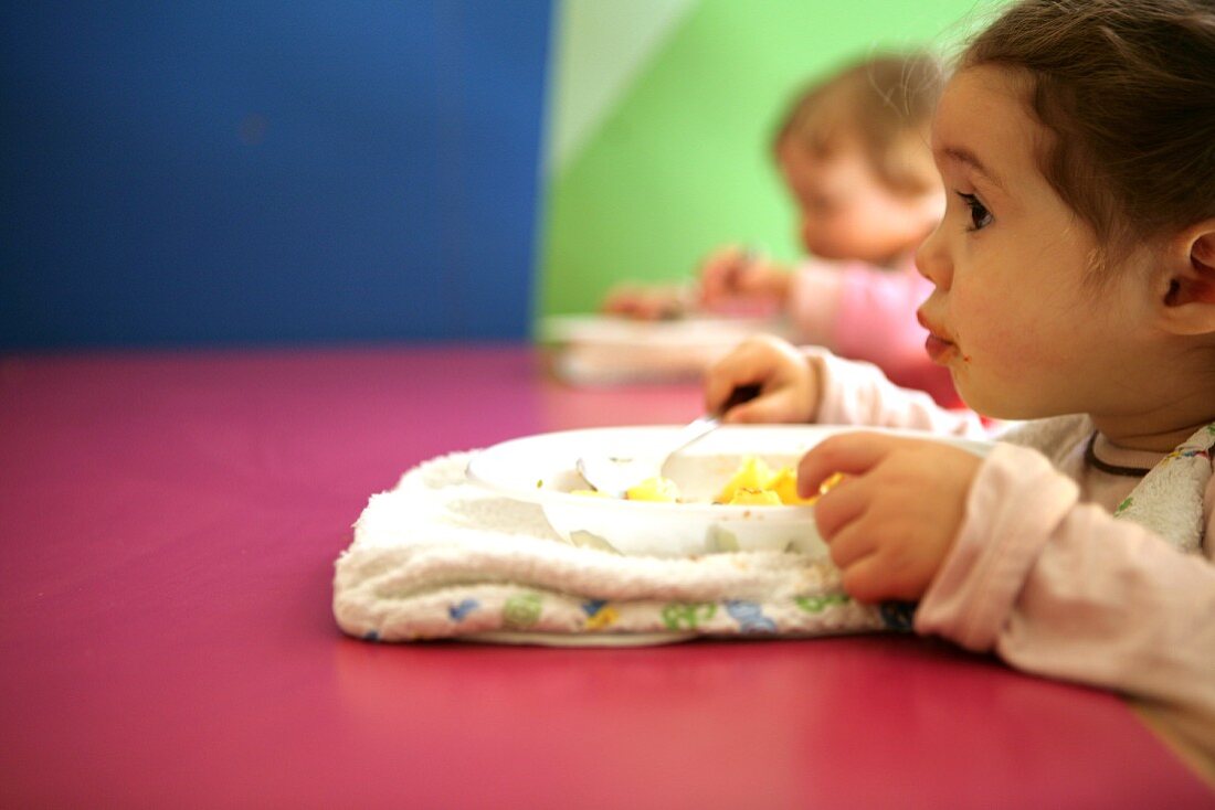 Babies having lunch