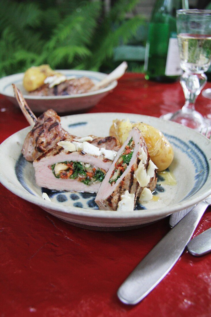 Veal chops filled with rocket, dried tomatoes and hazelnuts