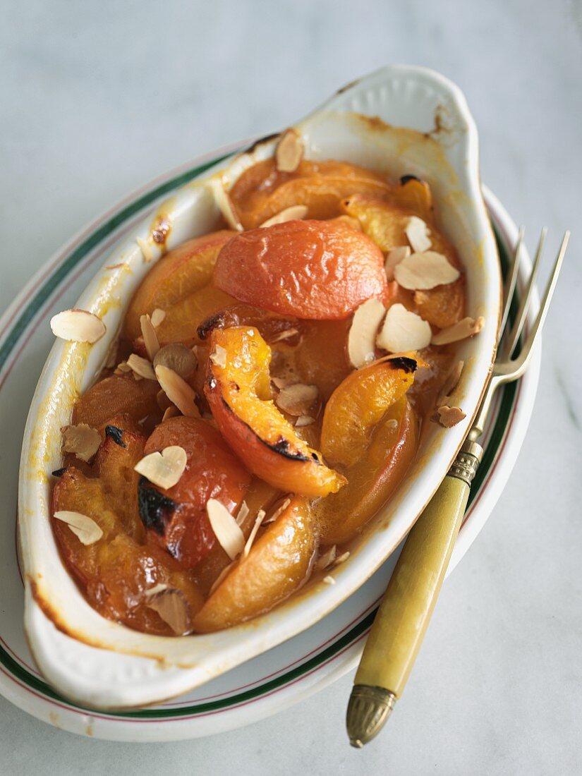 Baked Apricots with Almonds; In a Baking Dish with a Fork