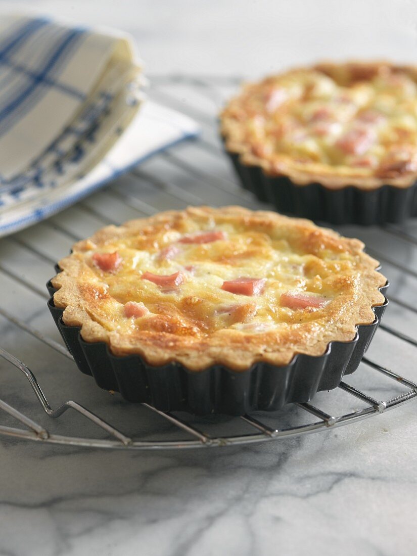 Mini Ham and Cheese Quiches on a Cooling Rack