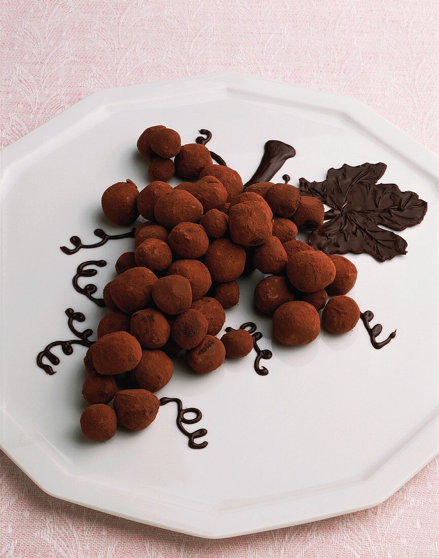 Truffle pralines in the shape of a bunch of grapes