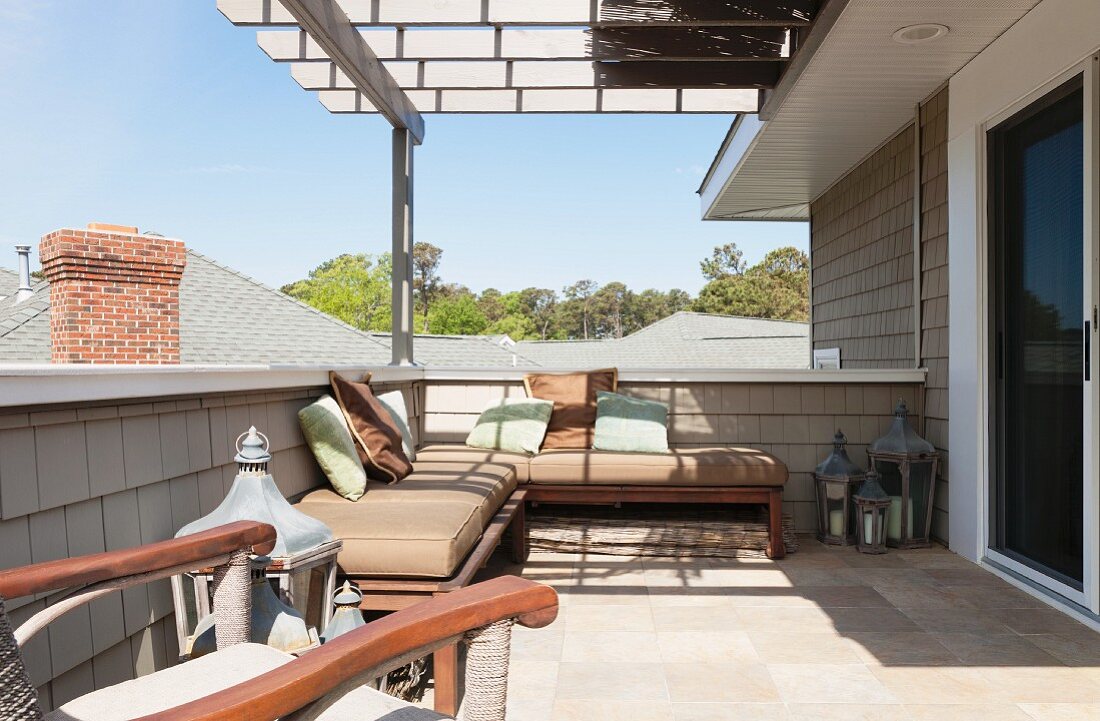 Roof terrace with pergola and comfortable seating