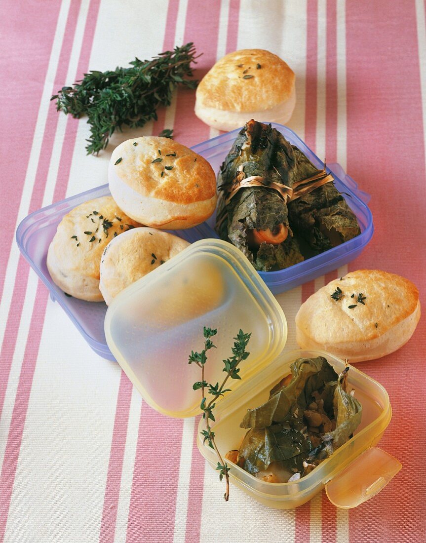 Mini unleavened breads and stuffed vine leaves for a picnic