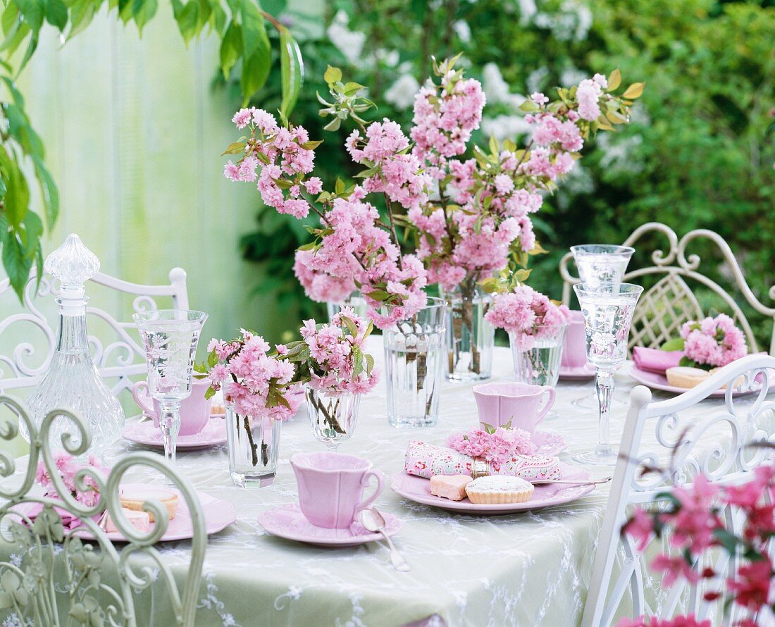 Japanese ornamental cherry blossoms in glasses and on napkins