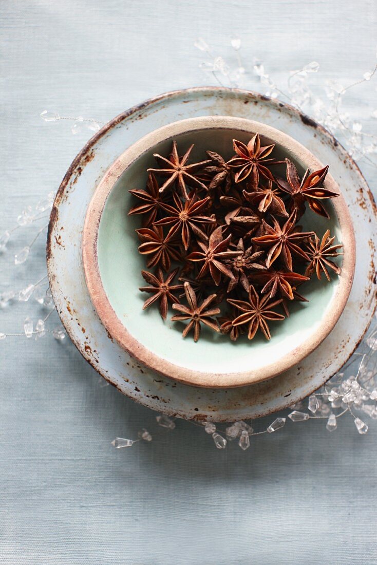 Star anise in a rustic bowl