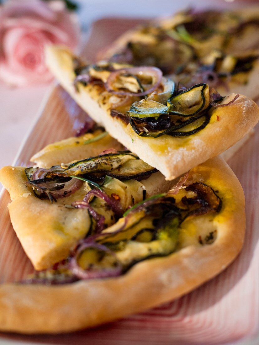 Courgette and onion pizzas