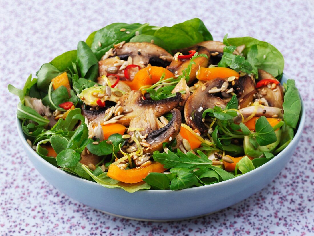 Mushroom salad with peppers and sesame seeds