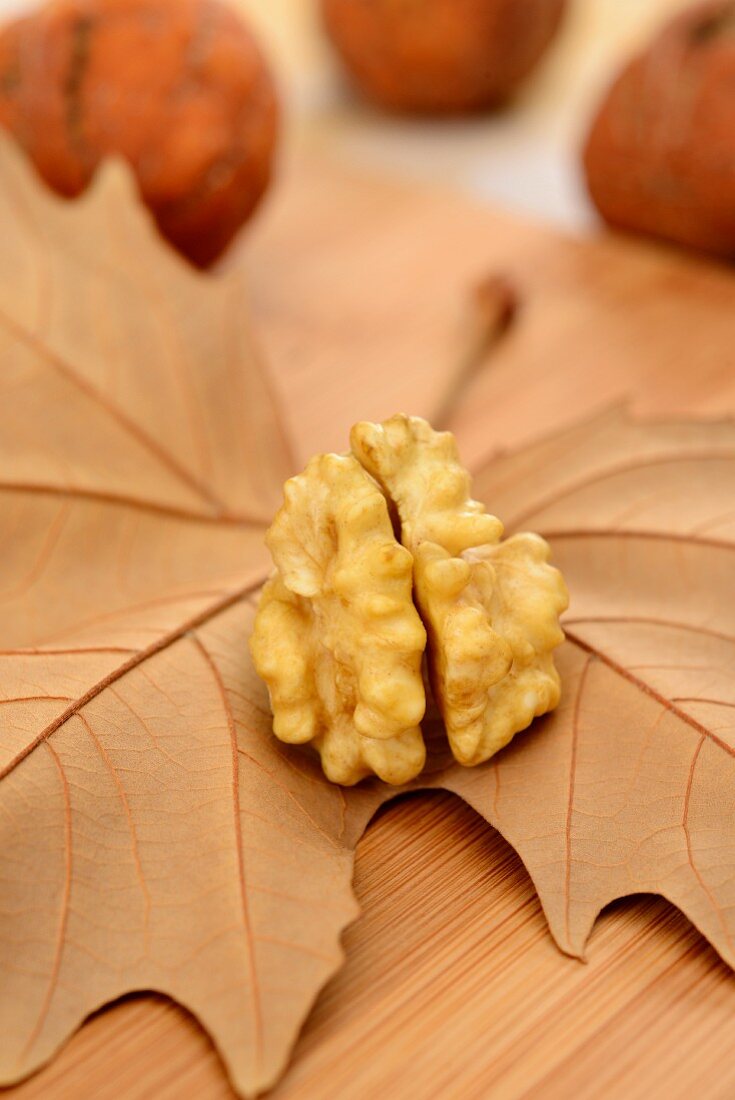 A walnut seed and walnuts