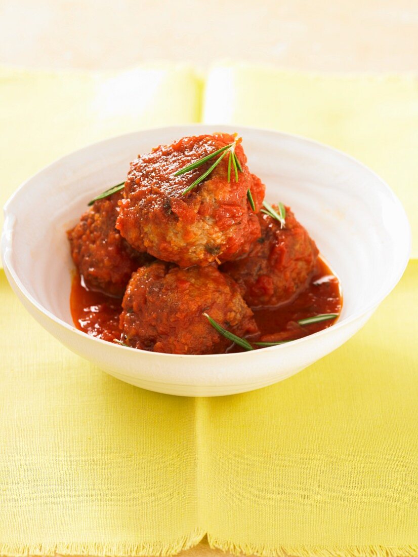 Meatballs in tomato sauce with rosemary