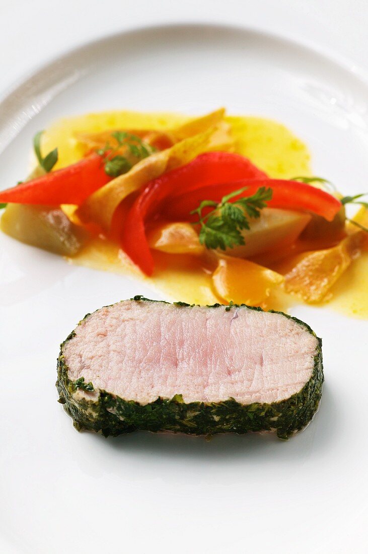 Poached saddle of veal with artichokes, tomatoes and spelt farfalle