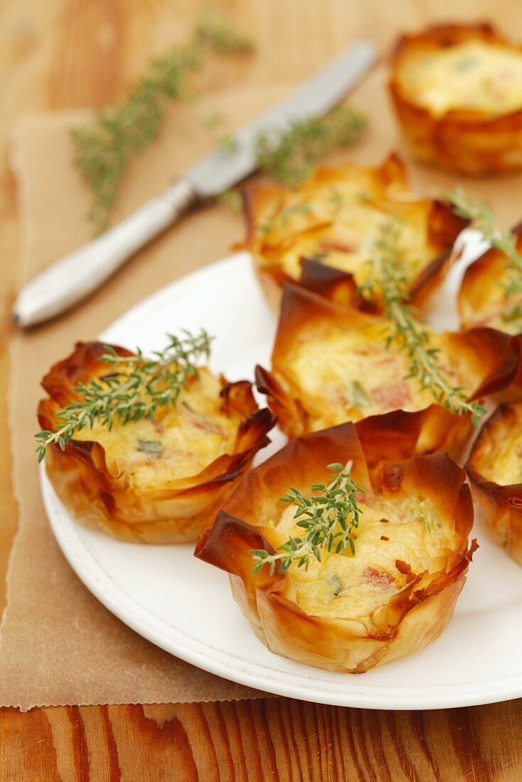 Bacon, spring onion, Parmesan and egg puff pastry pies