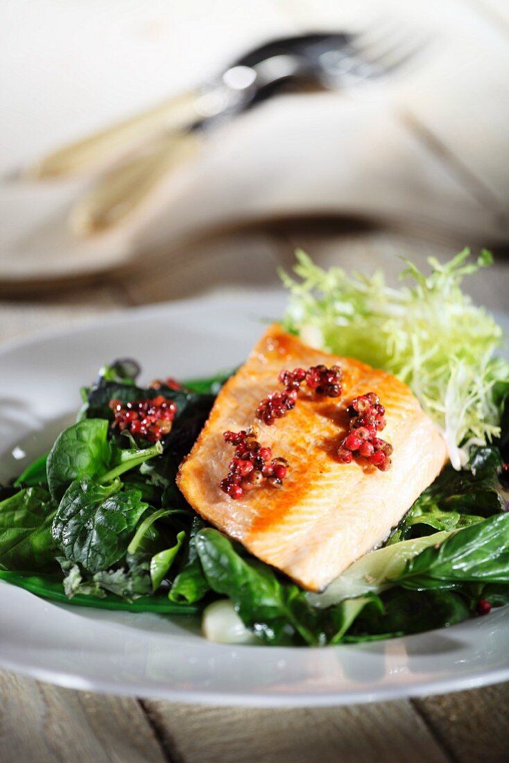 Char on a bed of spinach