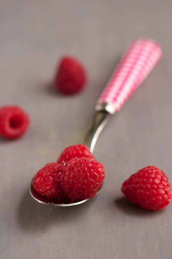 Fresh raspberries on a spoon