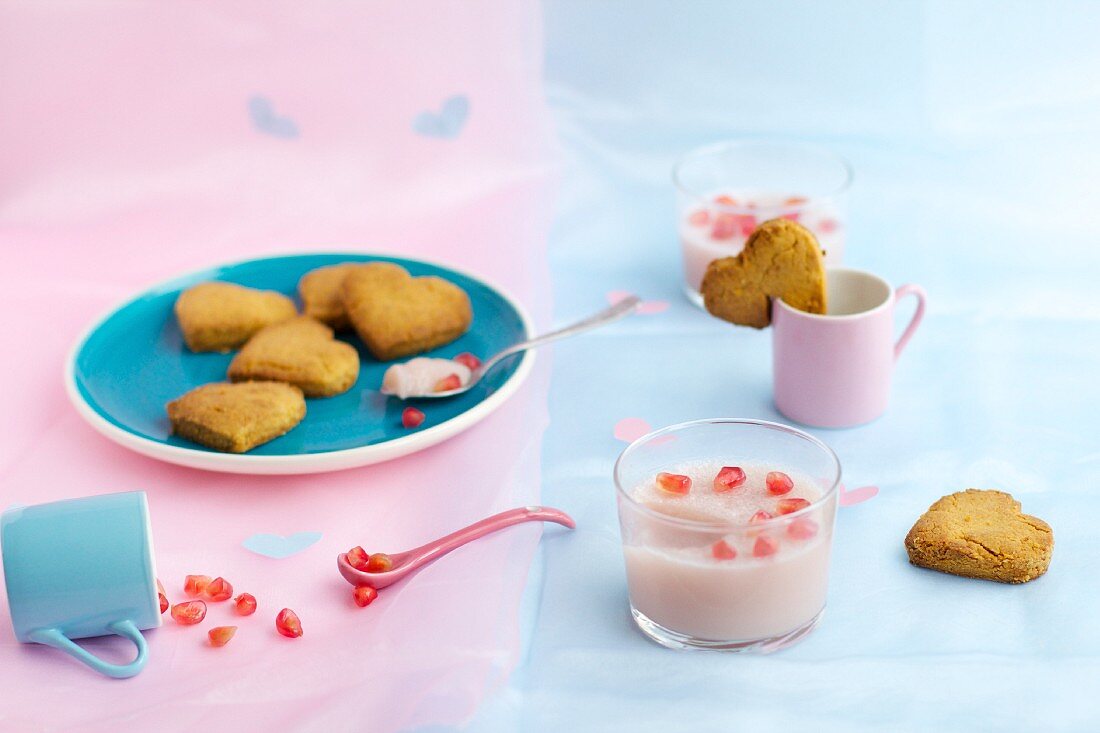 Cardamom biscuits and rose and pomegranate panna cotta