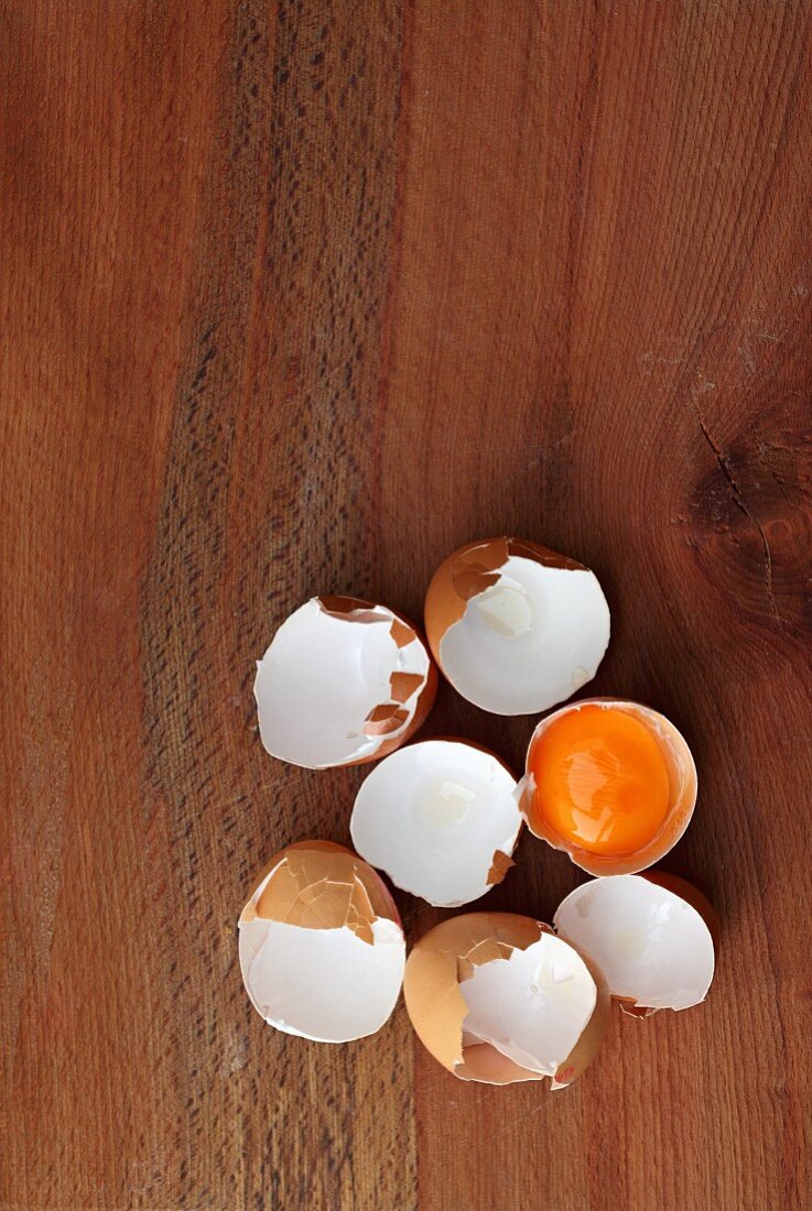 Eggshells on a wooden surface
