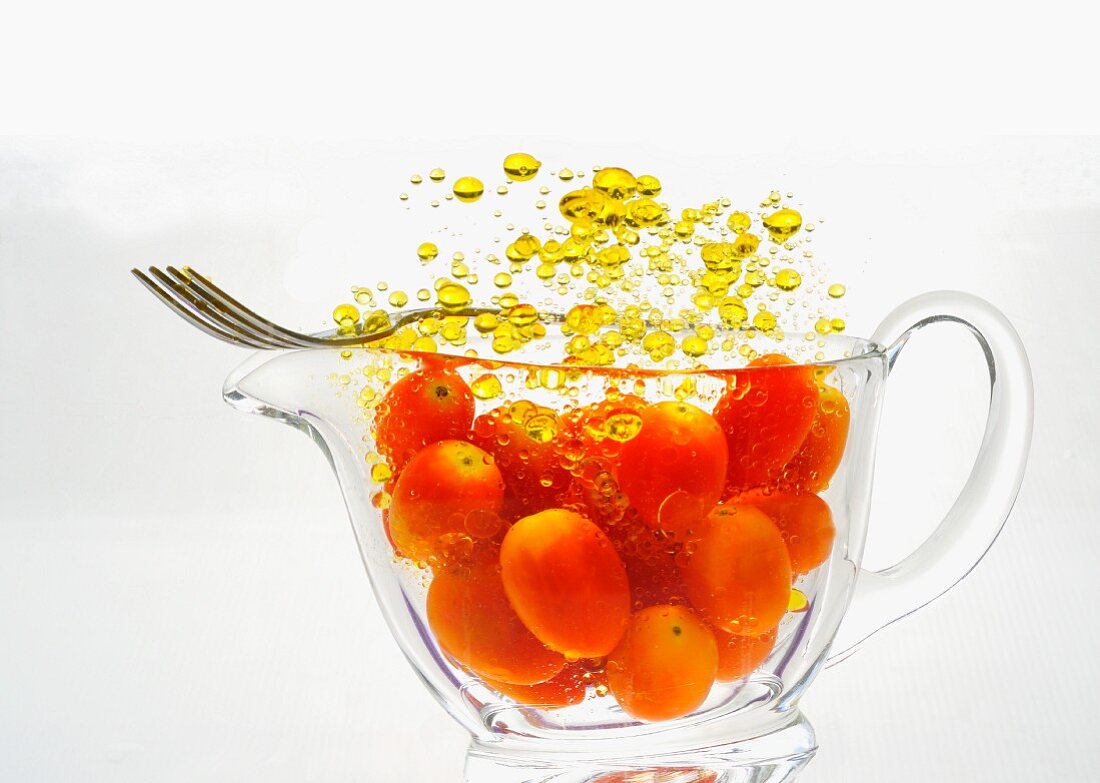 Cherry tomatoes with droplets of oil