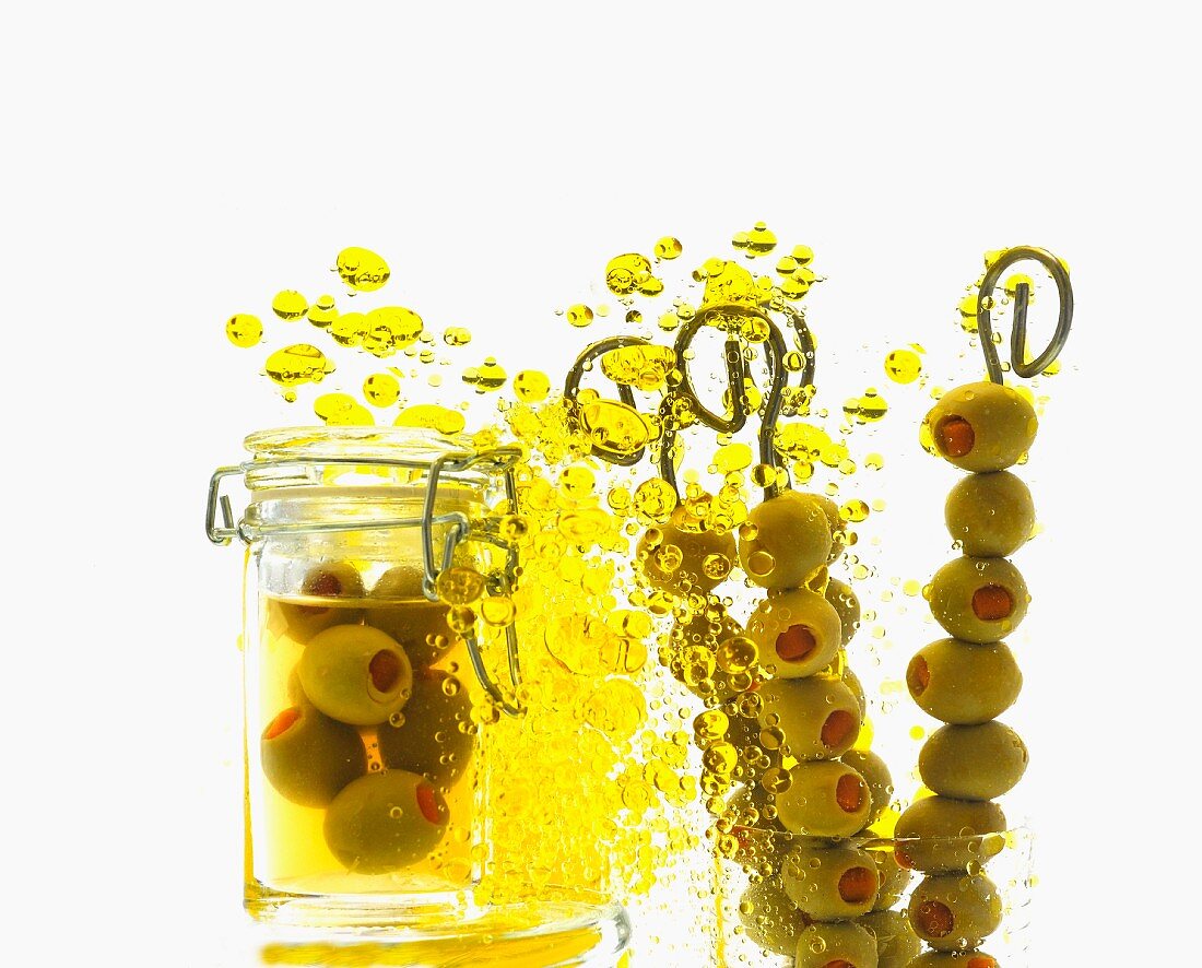 Green olives with olive oil bubbles