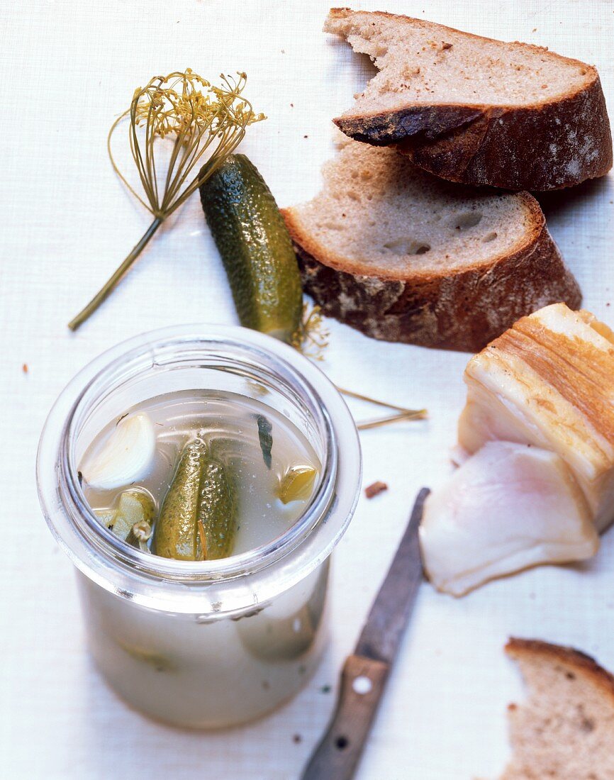 Pickled gherkins, bacon and bread
