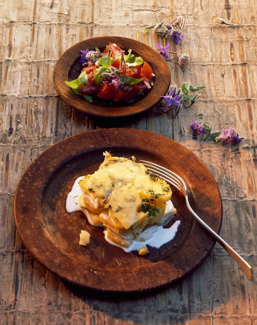 Potato gratin with tomato salad