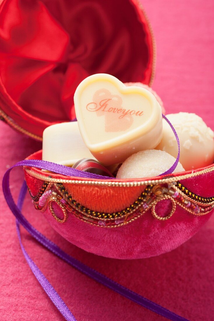 Pralines in a round gift box for Valentine's Day