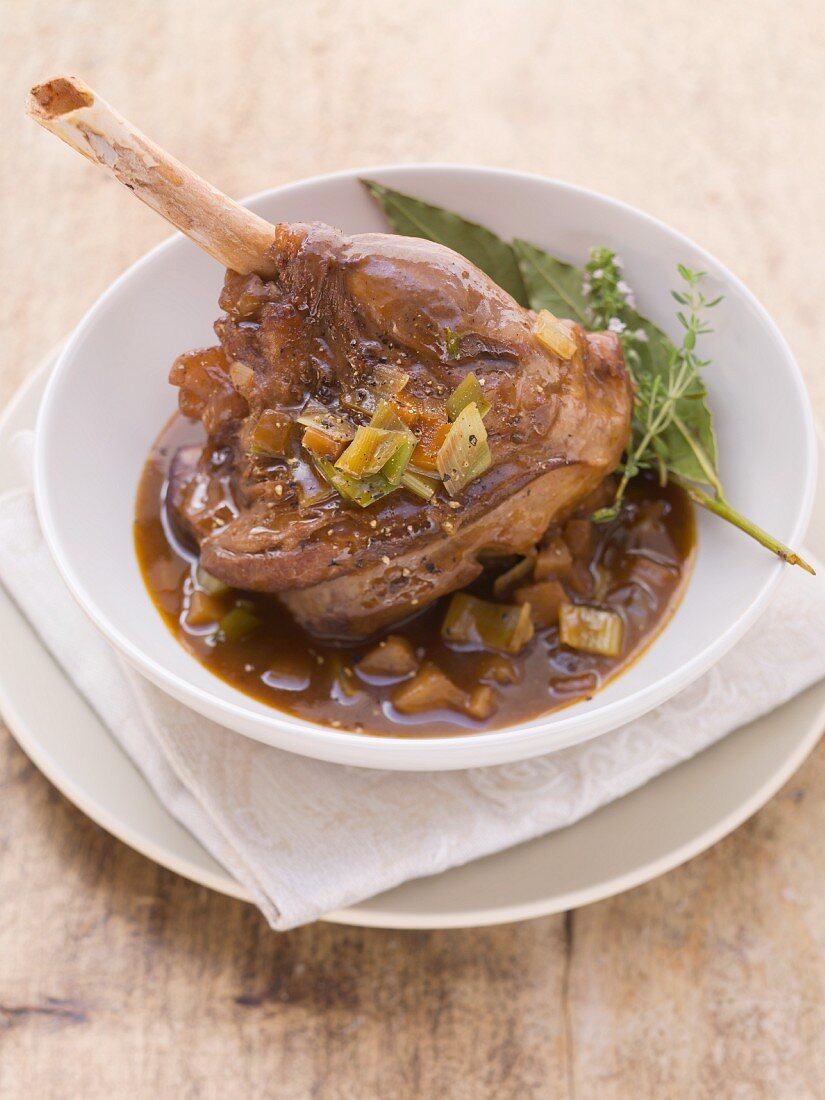 Braised lamb knuckle and red wine sauce