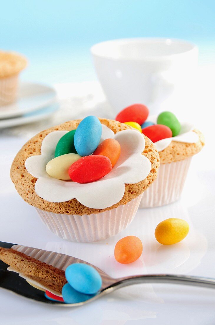 Cupcakes decorated with colourful sugar eggs