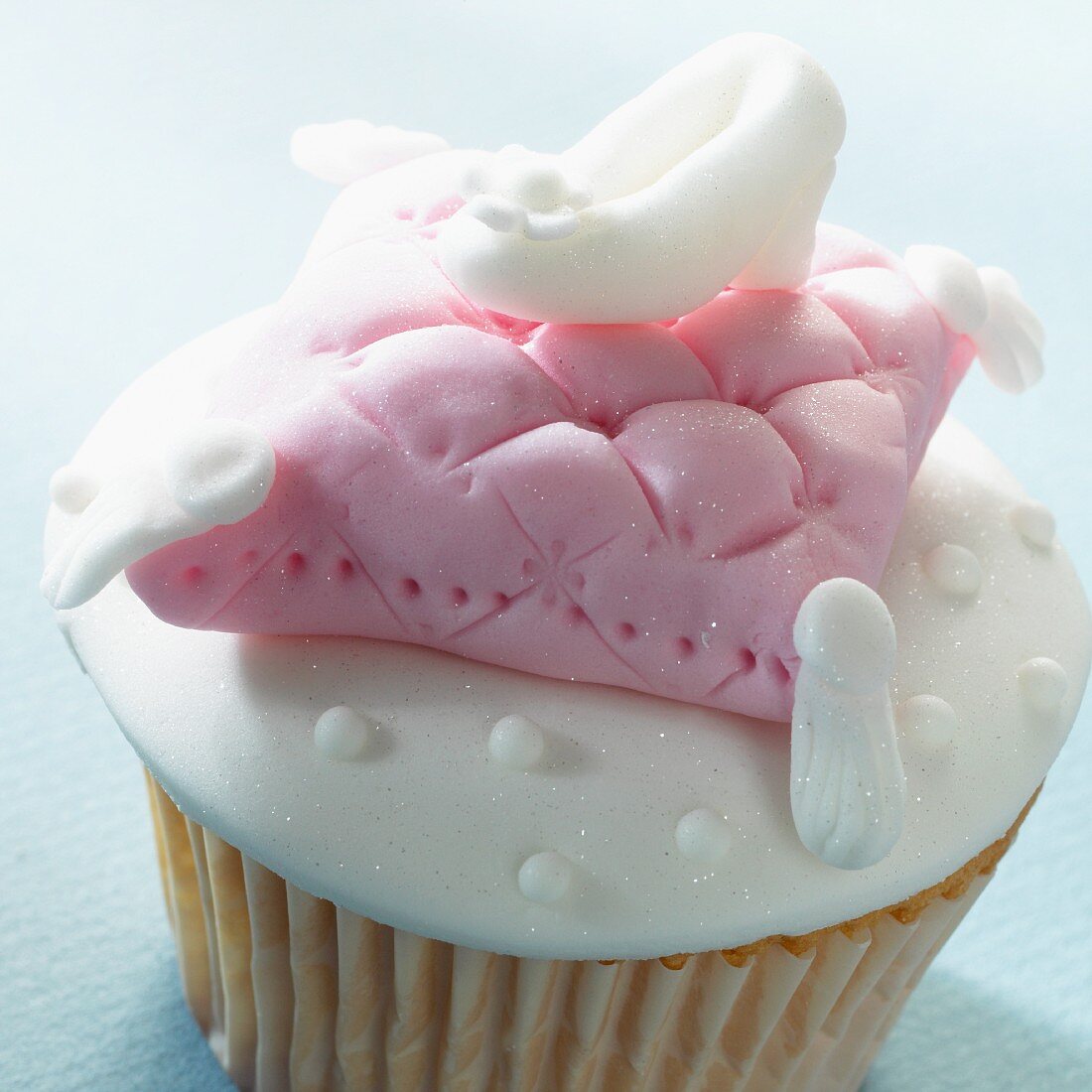 A cupcake with a fairytale decoration