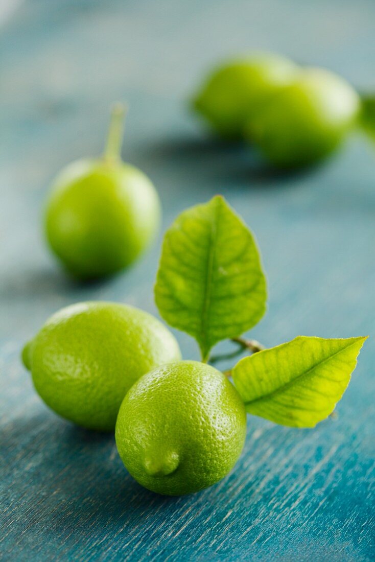 Limes on a rustic surface
