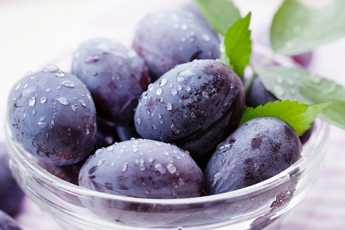 Damsons in a glass bowl