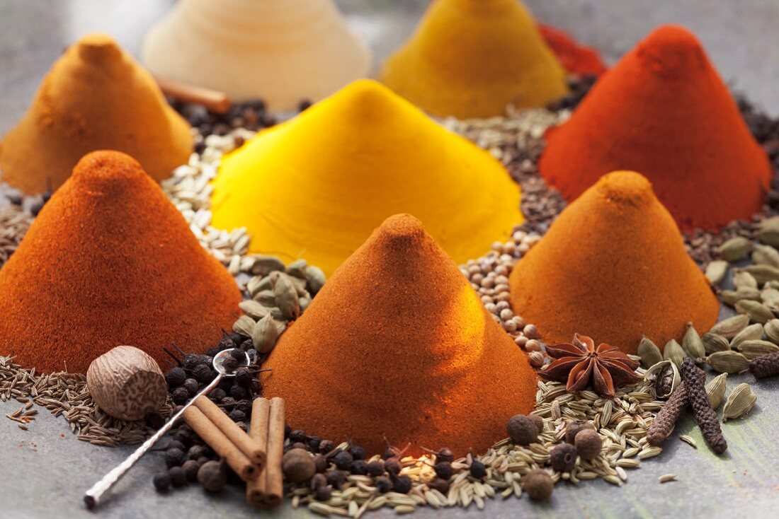 An arrangement of piles of spices