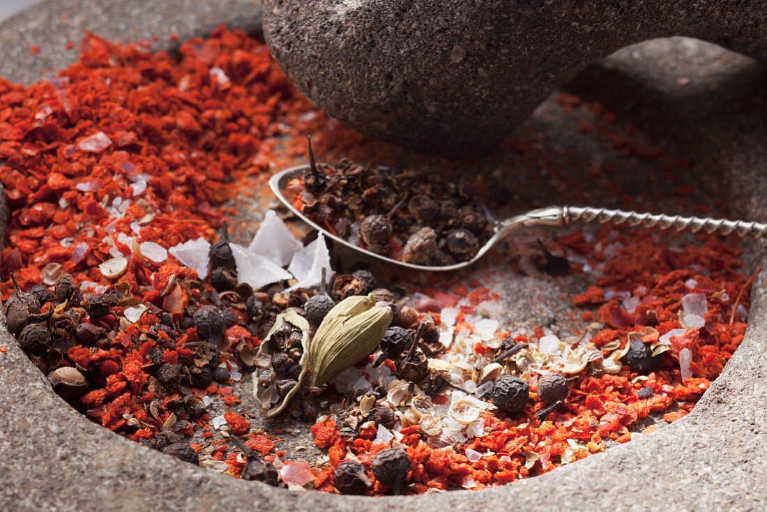 Roughly ground spices in a stone mortar