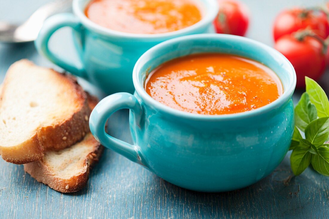 Tomato and carrot soup with toasted bread