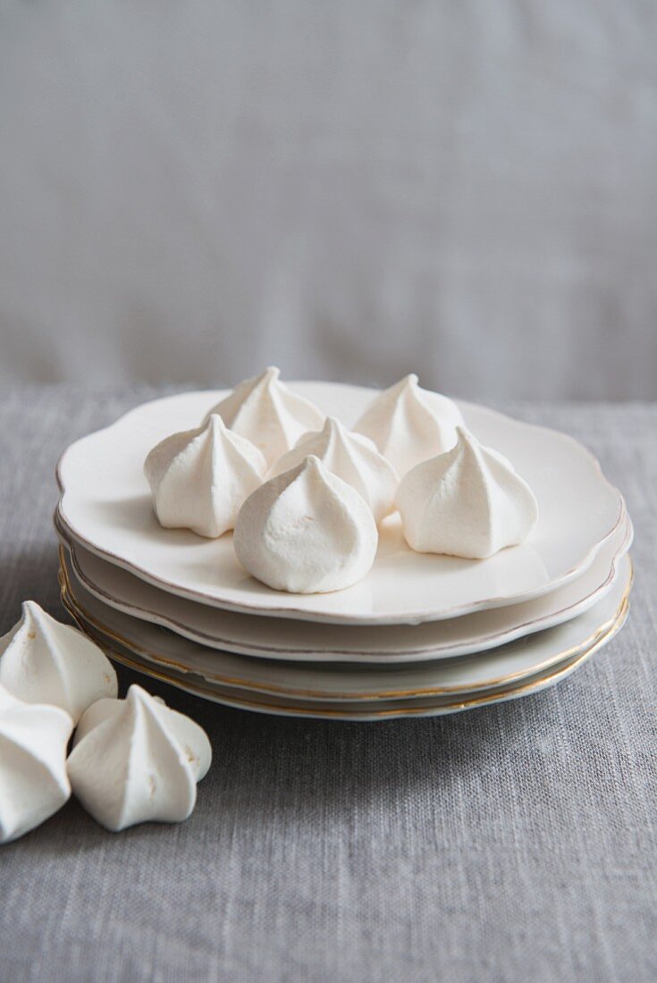Meringues on a stack of plates